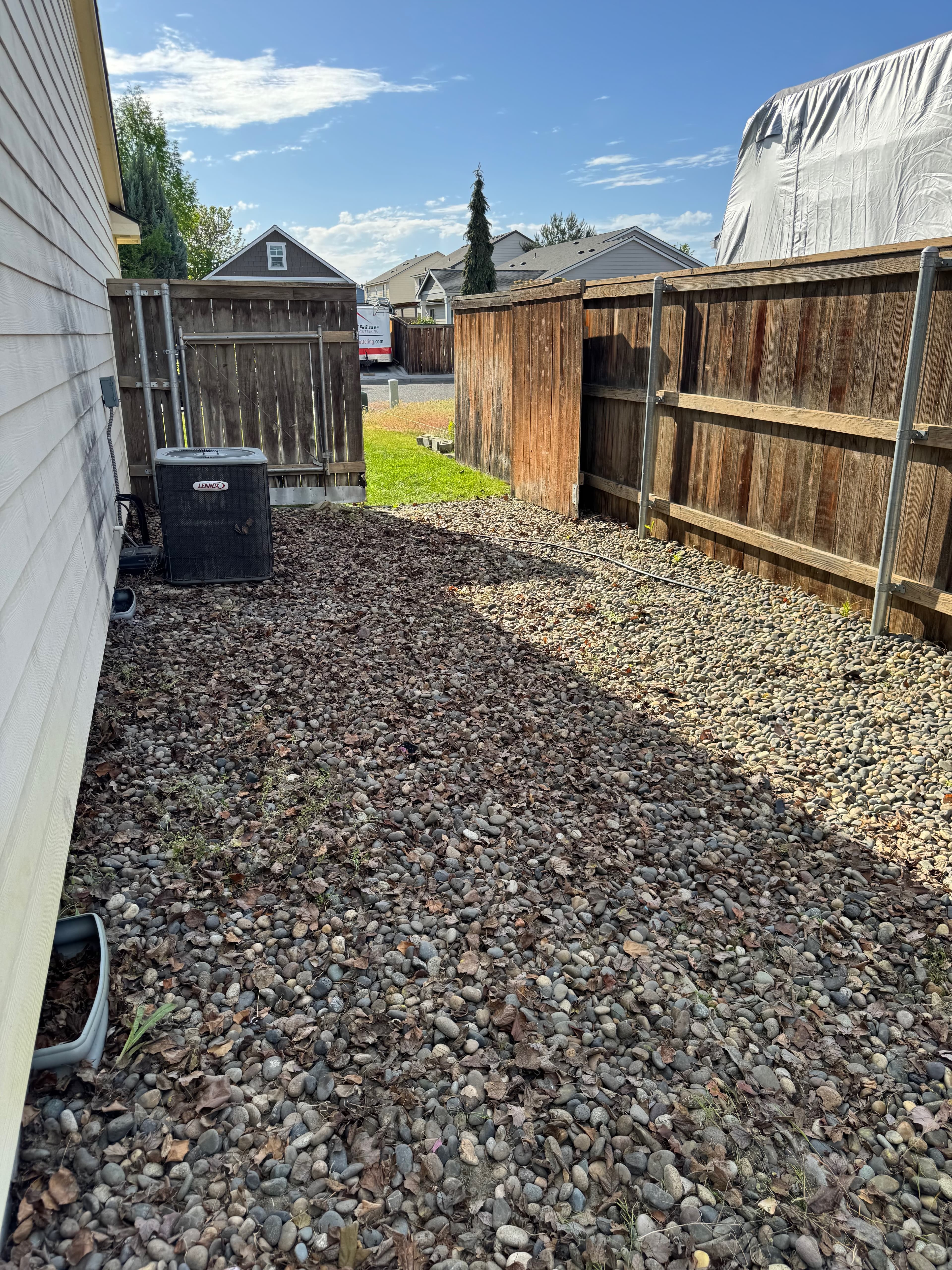 Wide after photo showing cleared outdoor space after junk removal